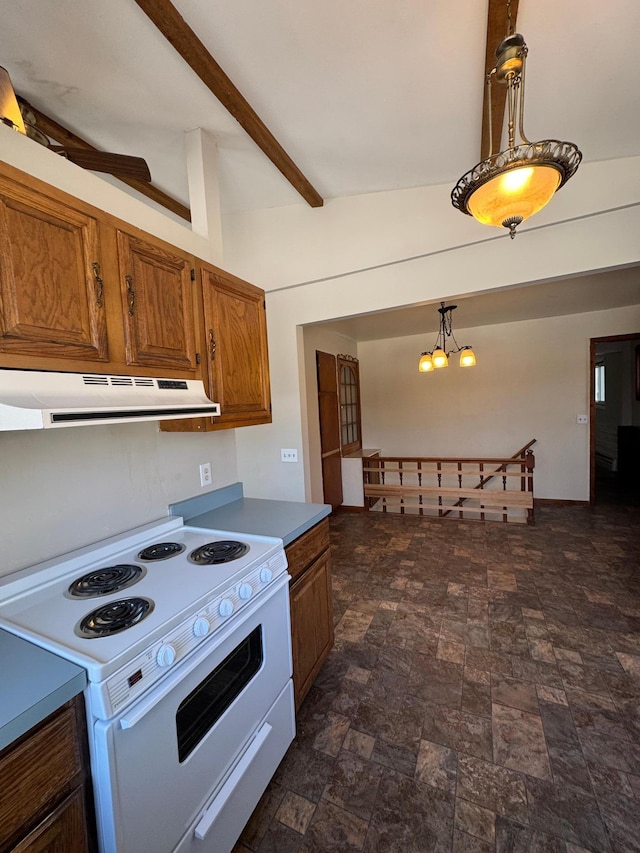 kitchen with electric stove, stone finish floor, brown cabinets, an inviting chandelier, and under cabinet range hood