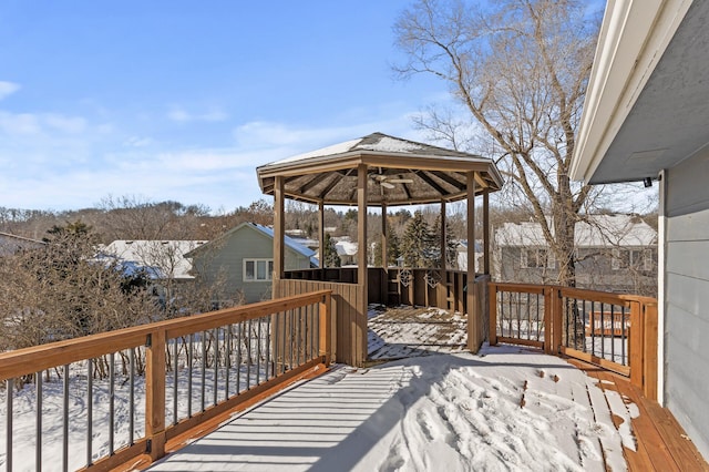 snow covered deck with a gazebo