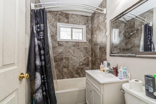 full bathroom with vanity, toilet, and shower / bath combo