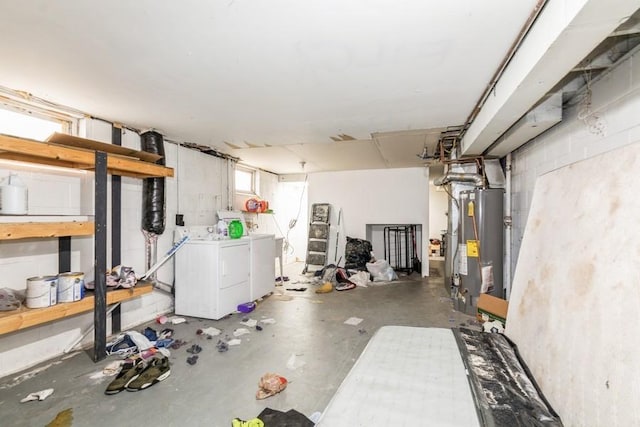 basement featuring separate washer and dryer and gas water heater