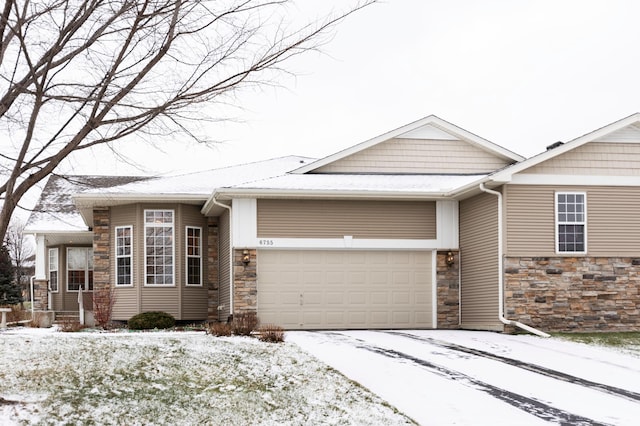 ranch-style home with stone siding