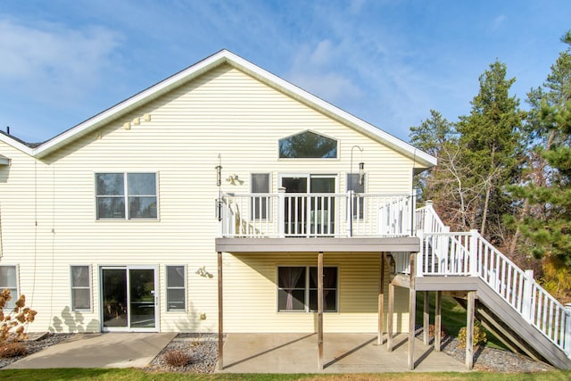 back of house with a patio area and stairway