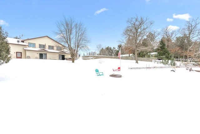 view of yard layered in snow