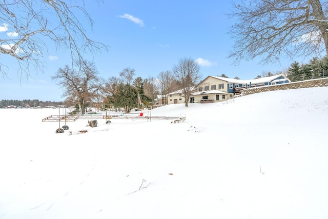 view of yard covered in snow