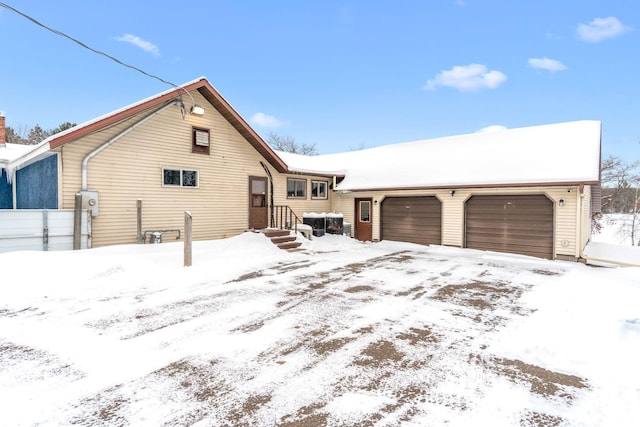 view of front of property featuring a garage