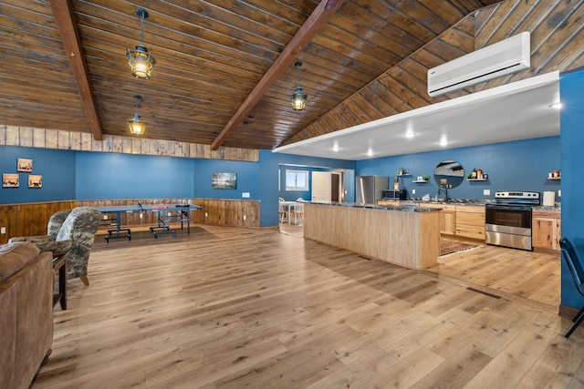 kitchen with vaulted ceiling with beams, stainless steel electric range oven, light brown cabinetry, light wood-style floors, and a wall mounted AC