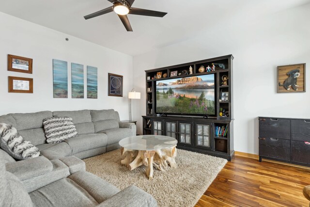 1240 2nd St Unit 704, Minneapolis, MN 55415 - living room with a ceiling fan, wood finished floors, and baseboards