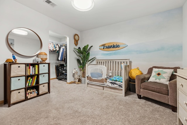 1240 2nd St Unit 704, Minneapolis, MN 55415 - carpeted bedroom with a walk in closet, a closet, and baseboards