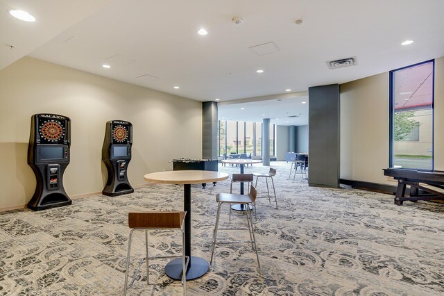 1240 2nd St Unit 704, Minneapolis, MN 55415 - interior space featuring carpet flooring, recessed lighting, baseboards, and a wall of windows