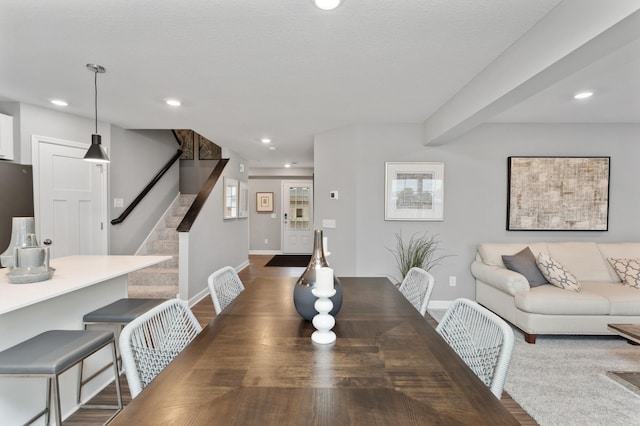 dining space featuring dark hardwood / wood-style floors