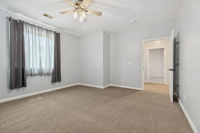 531 Depree Way, Glenwood, MN 56334 - carpeted empty room featuring a ceiling fan, baseboards, and a smoke detector