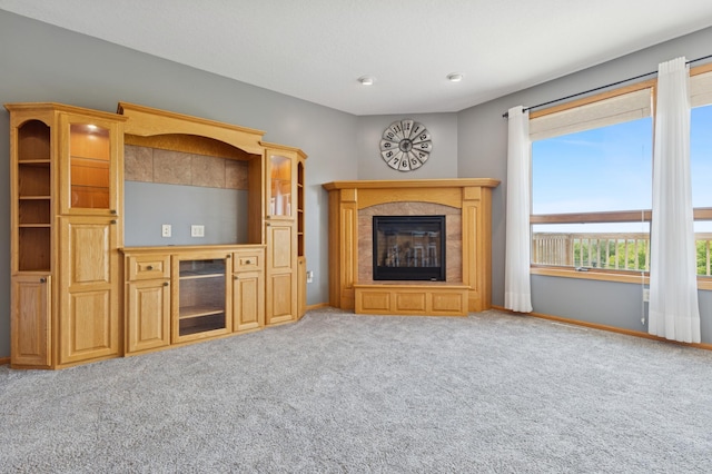 531 Depree Way, Glenwood, MN 56334 - unfurnished living room featuring carpet flooring, a high end fireplace, and baseboards
