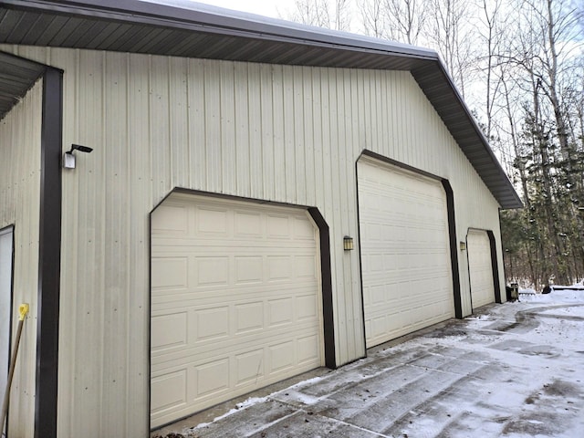 view of snow covered garage