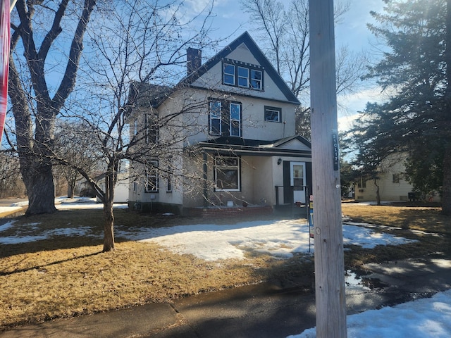 view of front of property with a chimney