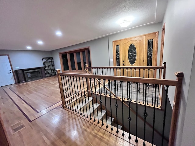 hallway featuring wood-type flooring