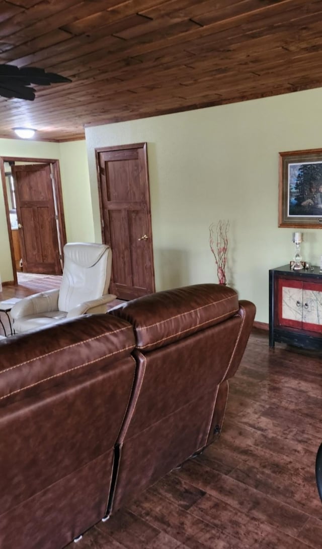 living room with dark wood-style flooring and wood ceiling