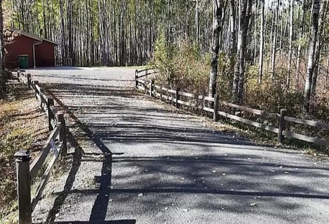 view of road featuring driveway