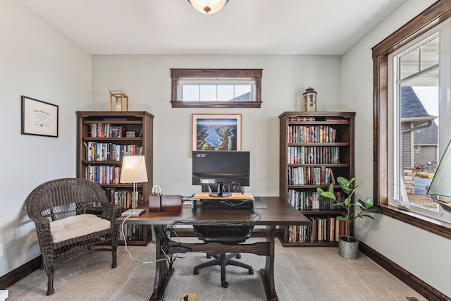 office area featuring carpet flooring and baseboards