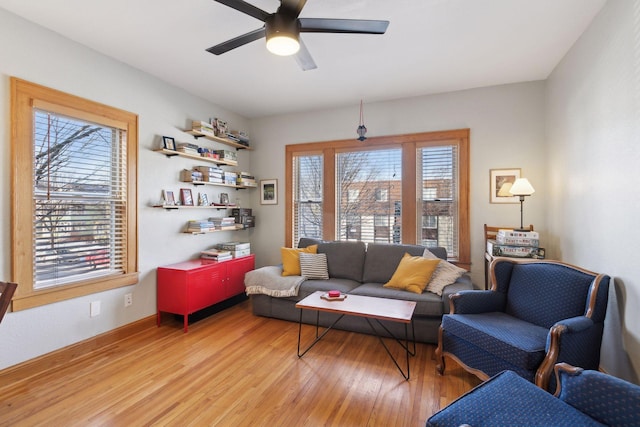 2701 Harriet Ave Unit 200, Minneapolis, MN 55408 - living area featuring a ceiling fan and light wood finished floors