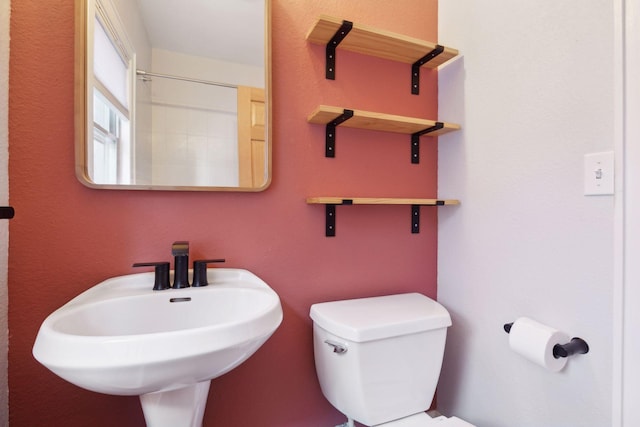 2701 Harriet Ave Unit 200, Minneapolis, MN 55408 - bathroom featuring a sink and toilet