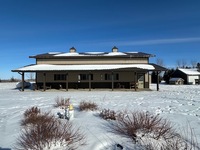 view of snow covered property