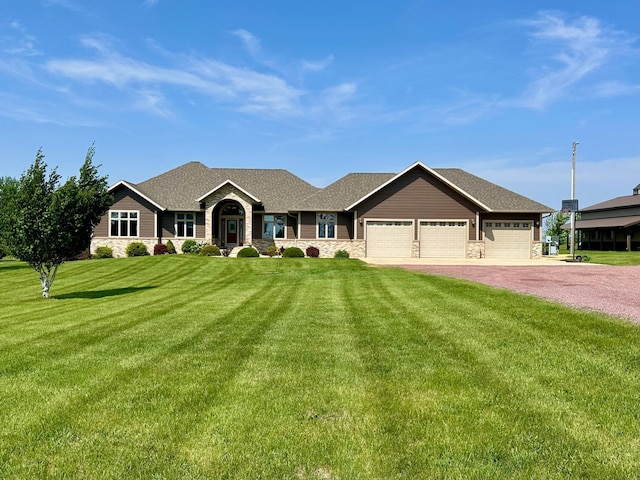 13943 Sundberg Ave, Graham Lakes Twp, MN 56131 - ranch-style house featuring stone siding, dirt driveway, a garage, a front lawn, and roof with shingles