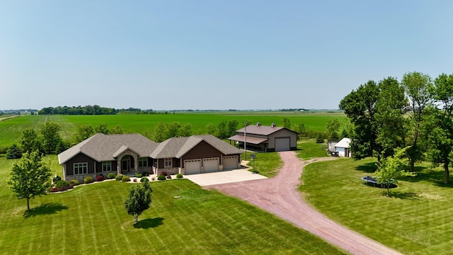 13943 Sundberg Ave, Graham Lakes Twp, MN 56131 - view of front of property featuring dirt driveway, an attached garage, a front yard, and a view of countryside