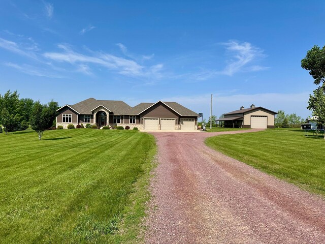 13943 Sundberg Ave, Graham Lakes Twp, MN 56131 - ranch-style home with dirt driveway, a front yard, and an attached garage