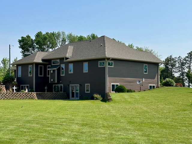 13943 Sundberg Ave, Graham Lakes Twp, MN 56131 - back of house featuring a lawn
