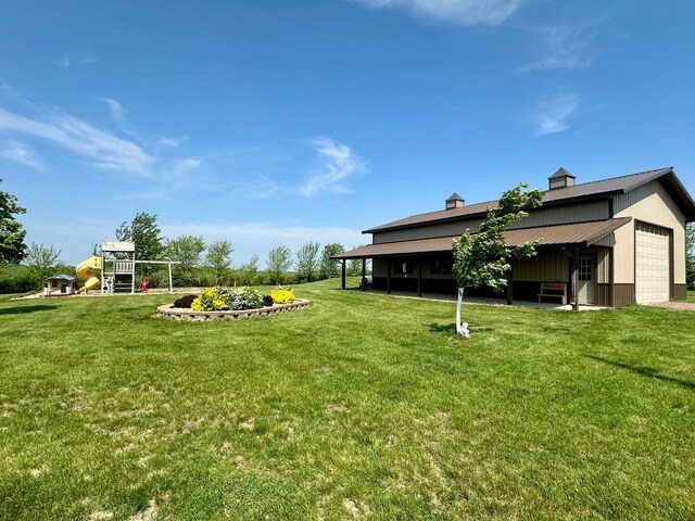 13943 Sundberg Ave, Graham Lakes Twp, MN 56131 - view of green lawn with a playground