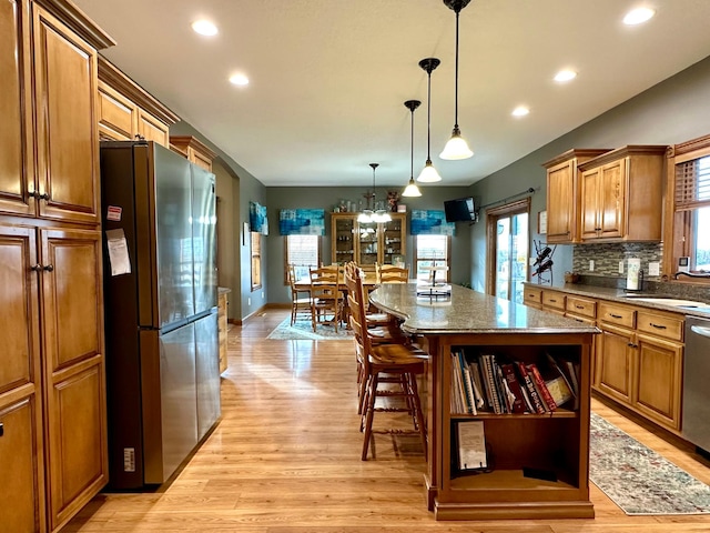 13943 Sundberg Ave, Graham Lakes Twp, MN 56131 - kitchen with appliances with stainless steel finishes, a kitchen island, light wood-type flooring, open shelves, and recessed lighting