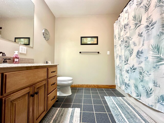 13943 Sundberg Ave, Graham Lakes Twp, MN 56131 - full bathroom featuring vanity, toilet, baseboards, tile patterned flooring, and a shower with curtain