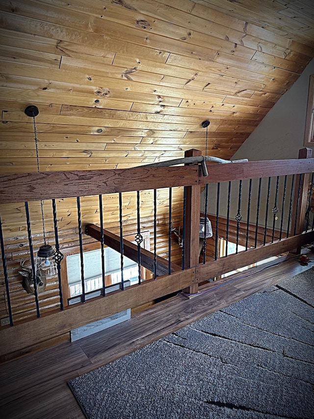 interior space featuring vaulted ceiling, wood-type flooring, and wood ceiling