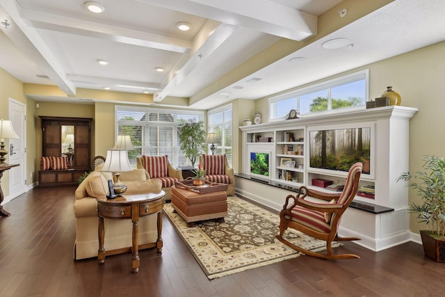 living area with beam ceiling, visible vents, baseboards, and hardwood / wood-style flooring