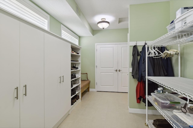 walk in closet featuring visible vents