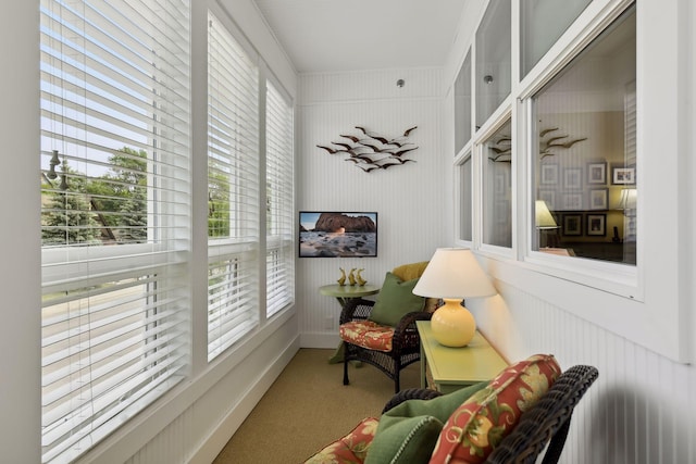 sitting room with carpet floors