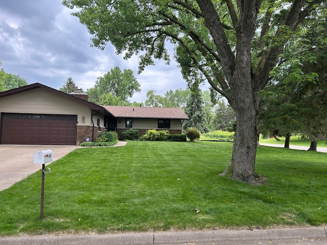 1754 Maple Ln, Roseville, MN 55113 - single story home with an attached garage, concrete driveway, a front yard, brick siding, and a chimney