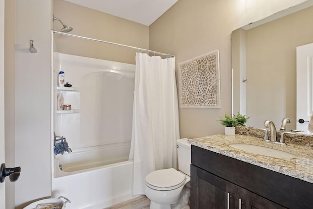 bathroom featuring vanity, toilet, and shower / tub combo with curtain