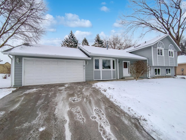 split level home with a garage