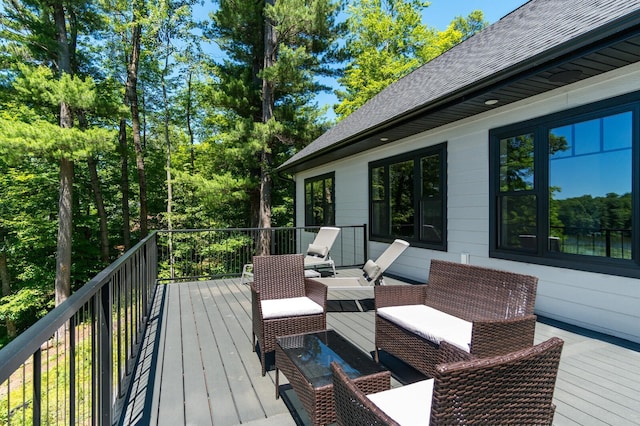 deck with an outdoor hangout area