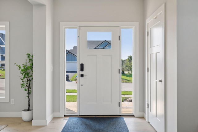 foyer entrance featuring light hardwood / wood-style flooring