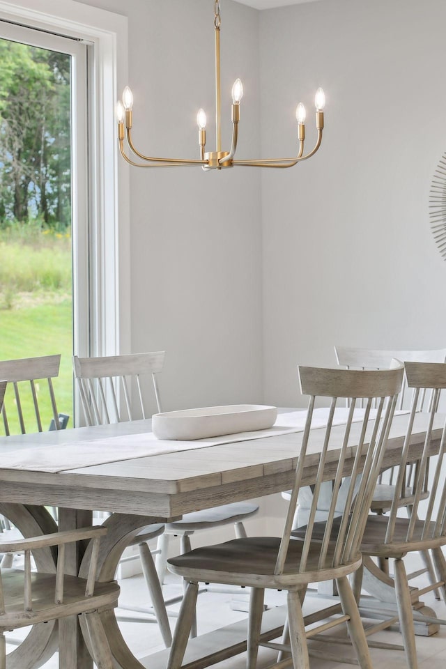 dining area featuring a chandelier