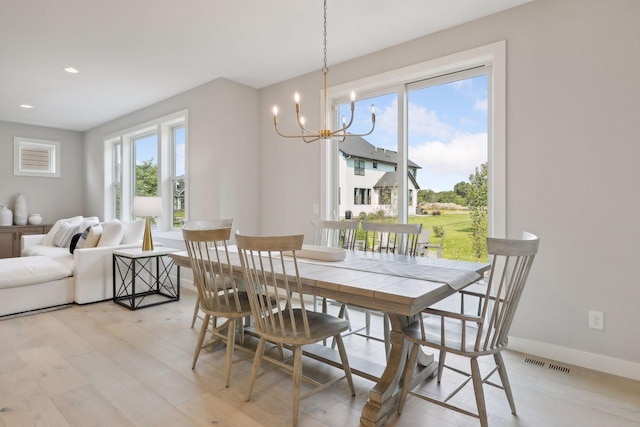 dining area featuring visible vents, baseboards, a chandelier, recessed lighting, and light wood-style floors