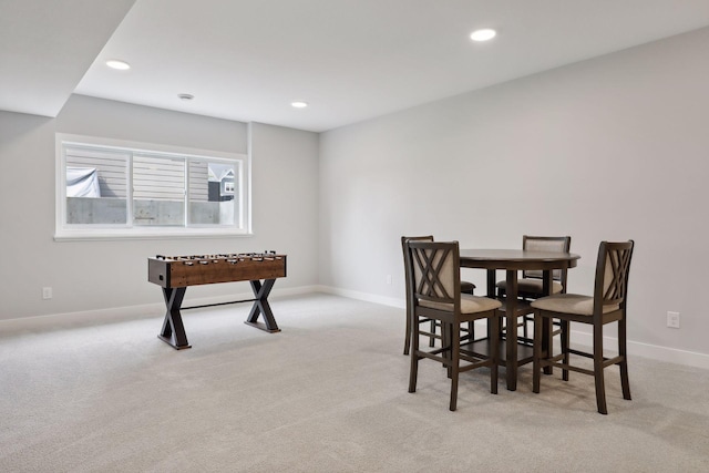 carpeted dining area featuring recessed lighting and baseboards