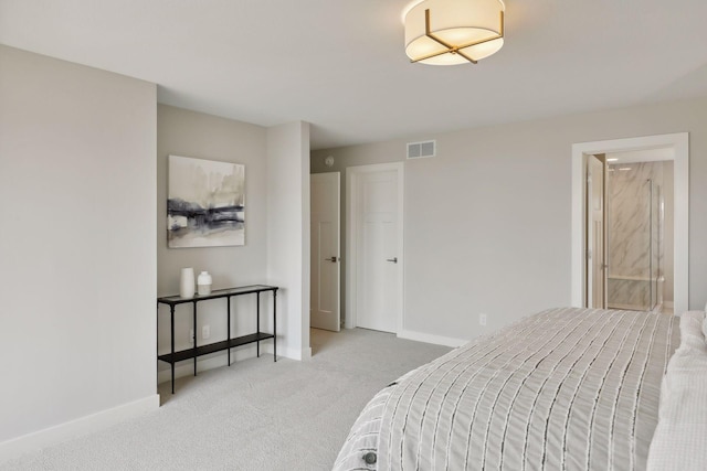 carpeted bedroom with baseboards and visible vents