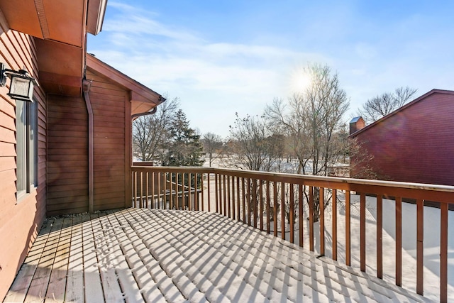 view of snow covered deck