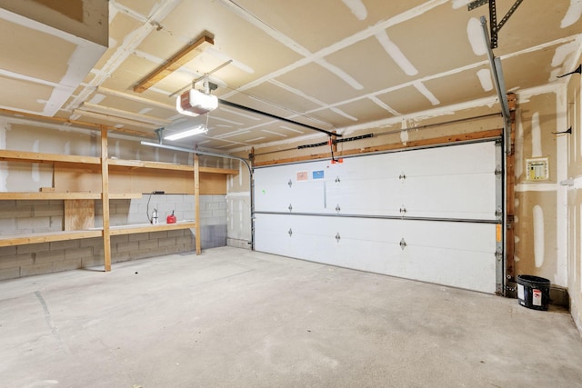 garage featuring a garage door opener