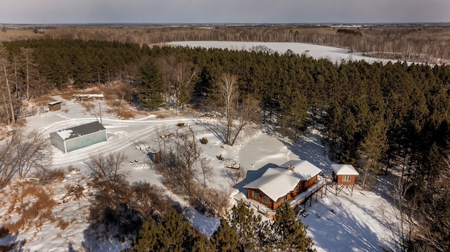 bird's eye view featuring a forest view