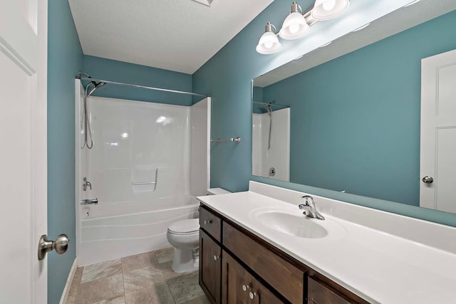 full bathroom with vanity, toilet, a textured ceiling, and washtub / shower combination