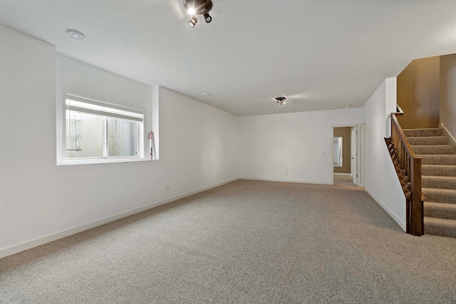 spare room with carpet floors